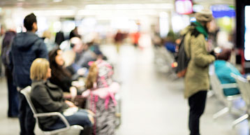 passengers waiting at arrivals